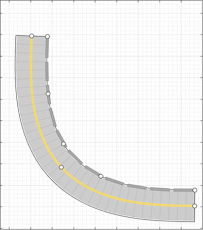 A curved road with jersey barrier along its right edge